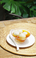 Black sesame dumplings in ginger syrup, Chinese sweet dessert