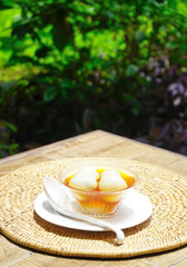 Black sesame dumplings in ginger syrup, Chinese sweet dessert