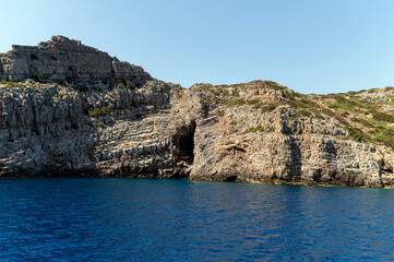 Scenic coastal rock formations along the crystalline waters of Crete Greece