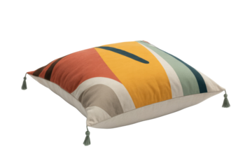 Vibrant abstract geometric pillow with colorful curved and striped patterns, featuring decorative tassels on a transparent background. background removed