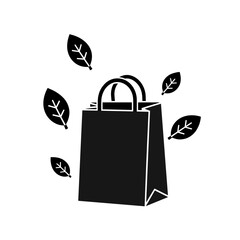 Black shopping bag surrounded by falling leaves in autumn sale  