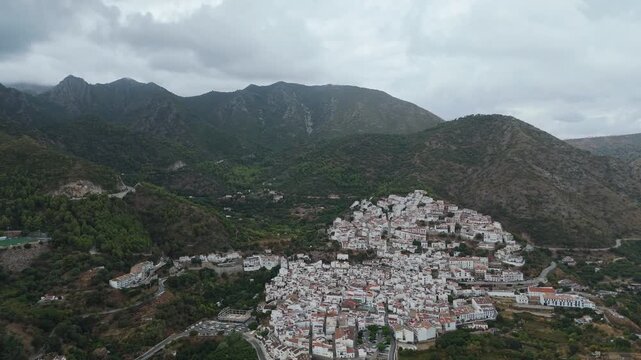 Aerial Landscape views of Ojen town. Ojen is a town and municipality that sits in the mountains behind Marbella in the autonomous community of Andalusia in southern Spain. Ambient drone exploration.