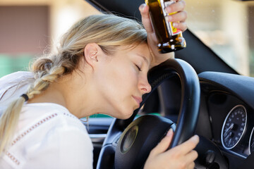 woman sleeping after drinking alcohol while driving
