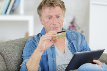 a mature man during online payment