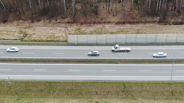 Modern Transportation of A4 Highway Bordered by Sound Barrier and Forest in Poland