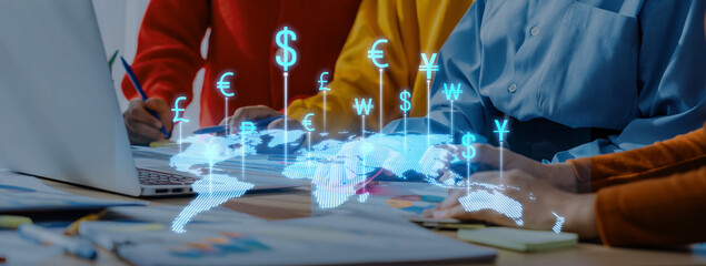 Diverse business professionals engage in a collaborative finance project, featuring a world map and...