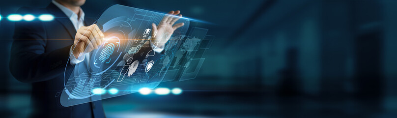 BIOMETRIC. Identity verification. Security officer using modern interface scanning fingerprints and...