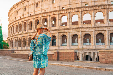 08 08 2025 Rome, Italy - Female traveler enjoying view of Colosseum