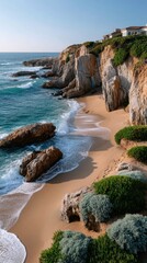Coastal Cliffside Beach with Turquoise Ocean Waves Crashing on Sandy Shore and Greenery Under Clear Blue Sky