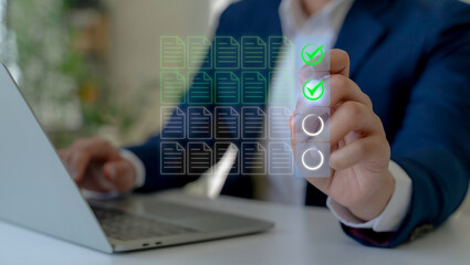 Digital Document Approval and Data Validation Process. Using laptop and touches virtual icons of documents with glowing green checkmarks. Digital approval, workflow automation and data validation.