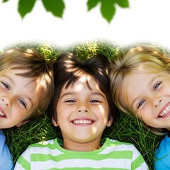 Joyful children lying together in grass smiling during sunny outdoor day