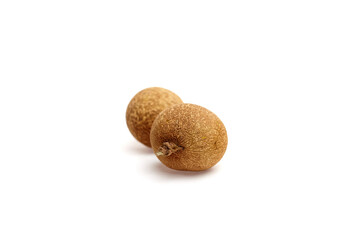 Longan tropical fruit with smooth brown skin and round shape, displayed on a clean white background, highlighting its natural texture and appealing appearance