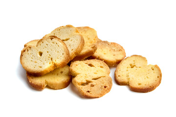 Freshly baked golden-brown bread slices arranged on a white background, showcasing their crispy texture and inviting appearance, perfect for culinary presentations and recipes