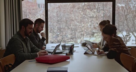 University students studying and working together in a bright and modern library setting. They collaborate, learn, and achieve academic success. - Powered by Adobe