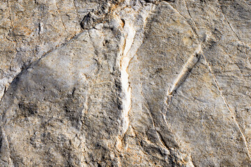 Real natural grunge rusted raw white marble stone surface texture as extracted from the mountain