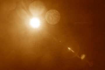 Dazzling sunshine sun rays with bokeh on yellow background. golden sunny banner with sunburst sunbeams. Abstract colorful template illustration. blurred image. shiny sun, sunbeams sunrays, sunshine