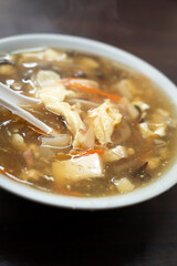 Delicious Hot and Sour Soup served in a bowl.