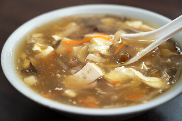 Delicious Hot and Sour Soup served in a bowl.