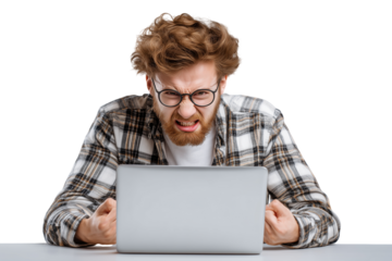 Frustrated young man displaying anger while working on a laptop at a desk in a simple setting Generative AI