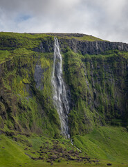 waterfall in mountains in Iceland