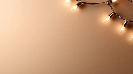 A string of illuminated lights casts a warm glow against a neutral backdrop, creating an inviting and cozy ambiance. The lights add a touch of festive charm to the setting.