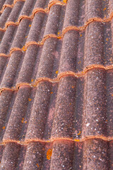 Background texture of Weathered Clay Roof Tiles with Rustic Texture.