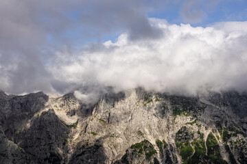 beautiful panoramic view of mountain peak covered by clouds. minimalist mountain landscape wallpaper. mountain background 