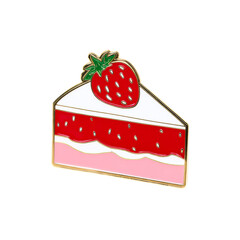 Slice of strawberry cake pin with gold trim on a transparent background, cut out