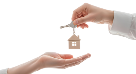 Real estate agent handing over house keys to a new homeowner after a successful property purchase agreement