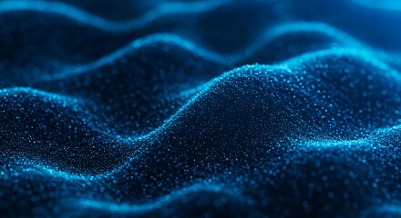 Abstract blue particle waves forming a dynamic, flowing surface
