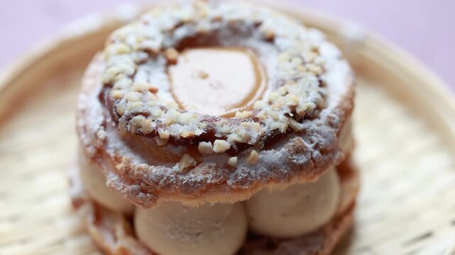 Close-Up of Pistachio and Pumpkin Christmas Paris-Brest Dessert
