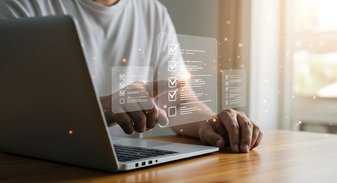 Businessman using a laptop with a virtual screen to complete tasks on a digital checklist. Concept of productivity, efficiency, and project management