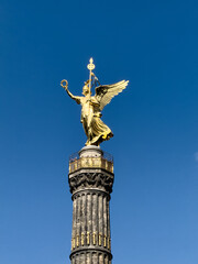 Fototapeta premium Berlin victory column victoria goddess statue on blue sky