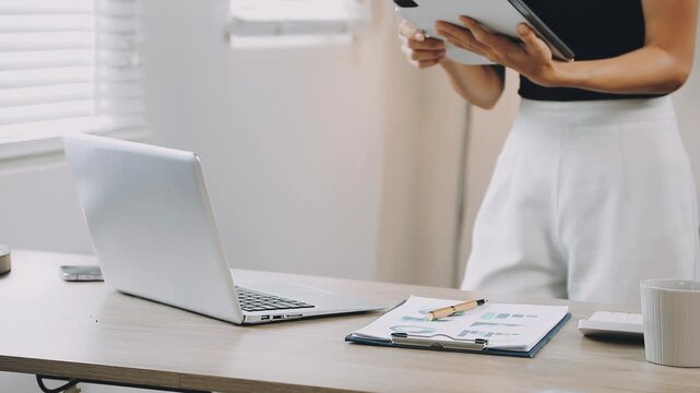 Flexible working. Young woman sitting on sofa using laptop remote work life balance happy home, hybrid, work from home ,remote ,work life balance
