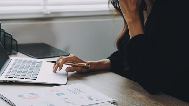 Flexible working. Young woman sitting on sofa using laptop remote work life balance happy home, hybrid, work from home ,remote ,work life balance