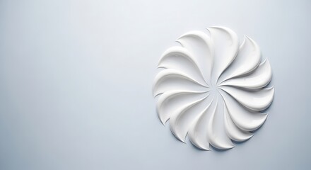 Obraz premium Swirls of white cream arranged in a circular pattern on a light gray background, creating a smooth and elegant texture, isolated on white background