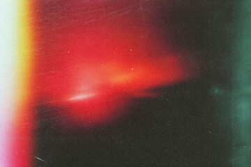 light leak overlay effect with scratch dust and blur red light leaks,retro noisy film texture light leak flare on black background,abstract background with colorful light,grunge old film burn