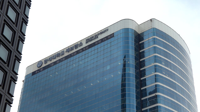 SEOUL, SOUTH KOREA - OCTOBER 11, 2025 - Yonsei University Severance Hospital building showing reflective blue glass facades and modern architecture in Seoul