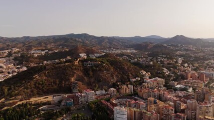 Aerial Landscape views of Malaga coastal city on the Costa del Sol. Malaga is a historical province in southern Spain's Andalusia region. Ambient drone exploration.