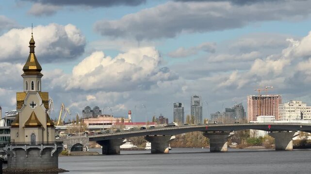 Kyiv city Ukraine, bridge over the Dnieper river, over the entrance to the Kiev Harbour located between Podil and Obolon neighborhoods.