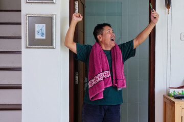 man taking a selfie photo after shaving in the bathroom