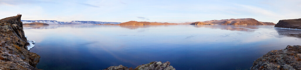  A panorama of Lake Baikal in early winter. View of the Olkhon Gate Strait