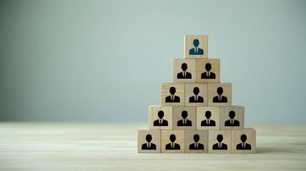 Visualizing organizational hierarchy with team members stacked in ascending levels, representing leadership and growth opportunities.