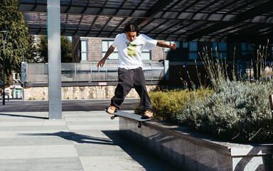 Skater Grinding a Ledge in Urban Skate Spot © Raquel