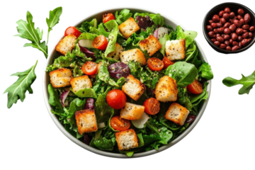 Fresh salad with croutons tomatoes and greens in a white bowl perfect for healthy eating and dieting on transparent background