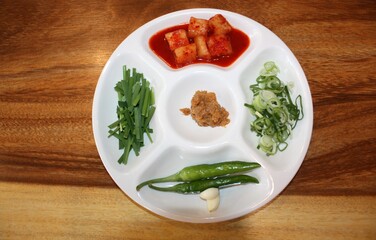 South Korean Food Dwaeji Gukbap Side Dishes: Ssamjang, Vegetables, and Kkakdugi Kimchi