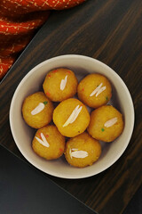 Traditional Sweets Laddu Garnished with Almonds 