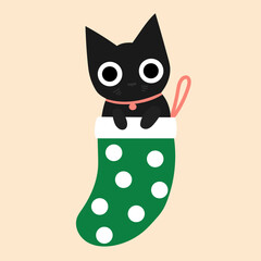 Black cat with large eyes sitting inside a green Christmas stocking with white dots.