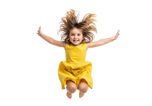Joyful little girl with wild hair in a yellow dress jumping high in the air isolated on transparent background