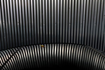 Stripes wall reflected on a car
